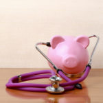 Piggy bank with stethoscope